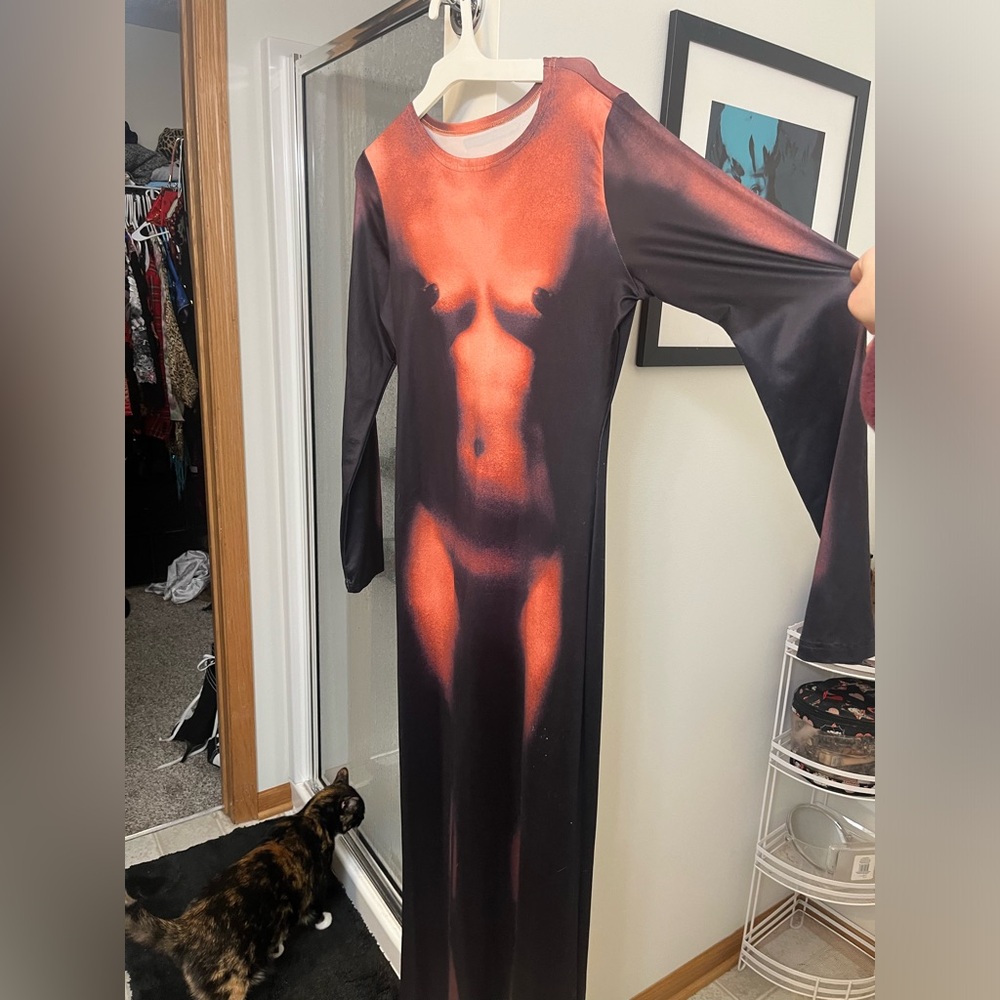Graphic woman’s dresss fits like medium/large